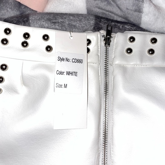 Leather mini skirt. Bought from RiffRaff in Fayetteville, Arkansas. Never worn. - Picture 3 of 3